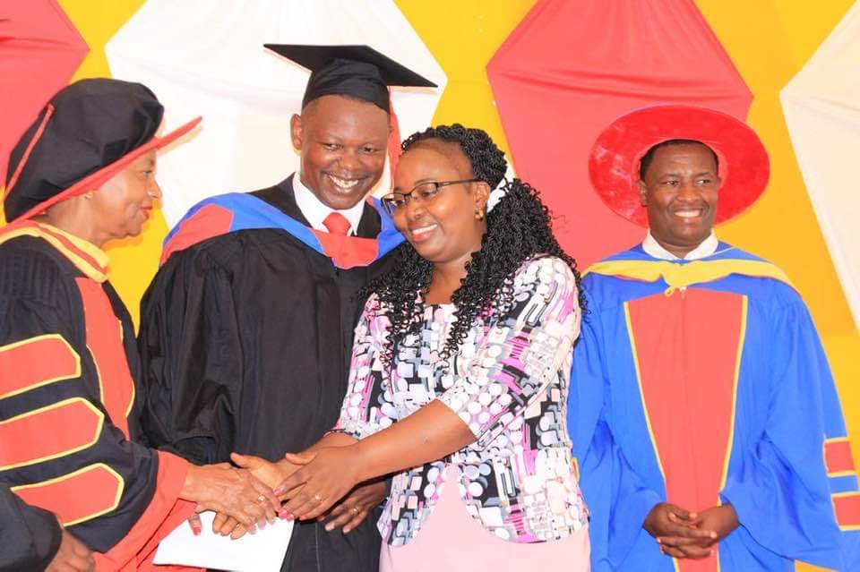 TAPCTC graduate in academic gown and cap at a graduation ceremony