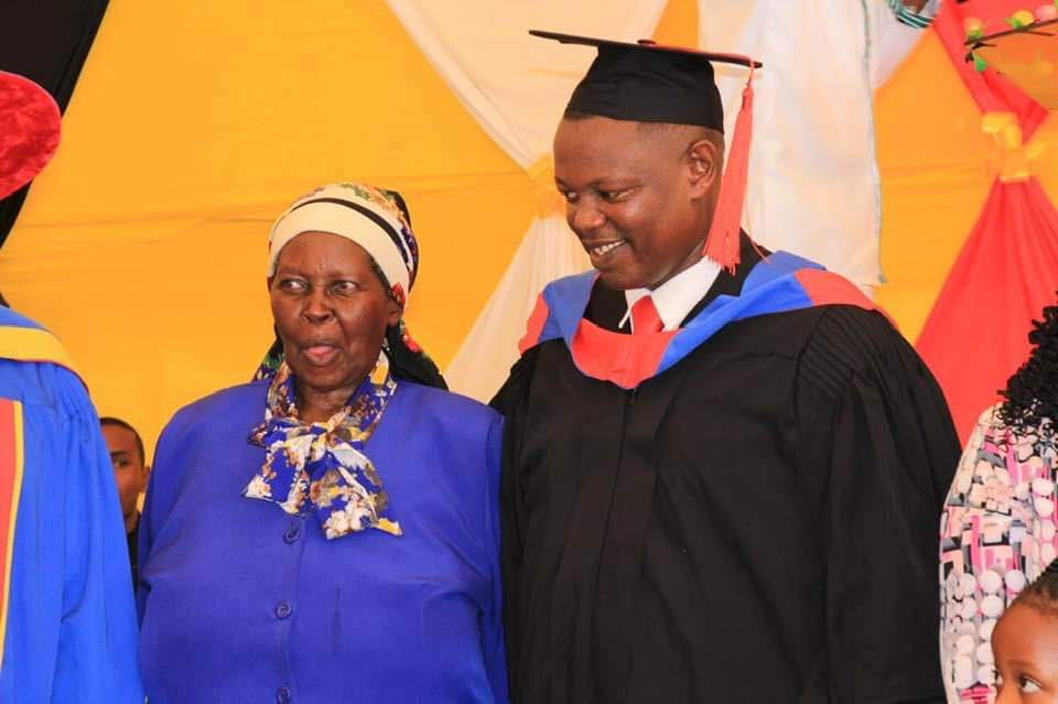 Graduate celebrating with family at the ceremony